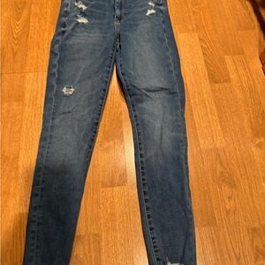 Distressed Blue Denim Jeans